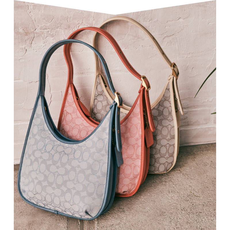 Blue, red and taupe purses.