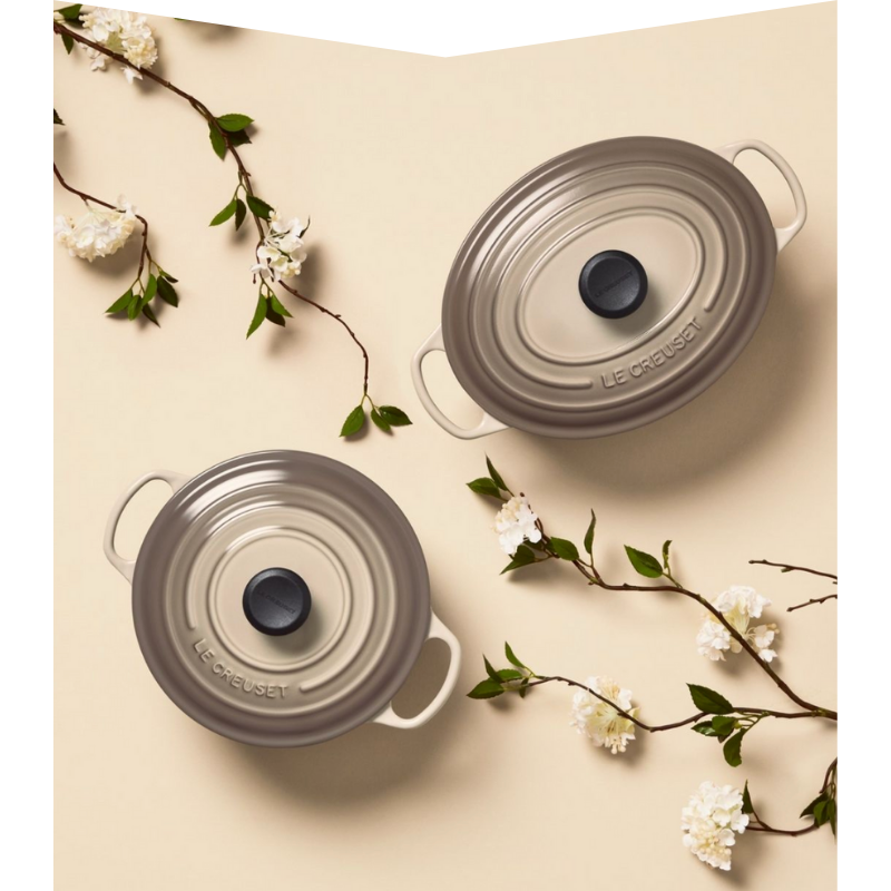 Two beige pots with lids.