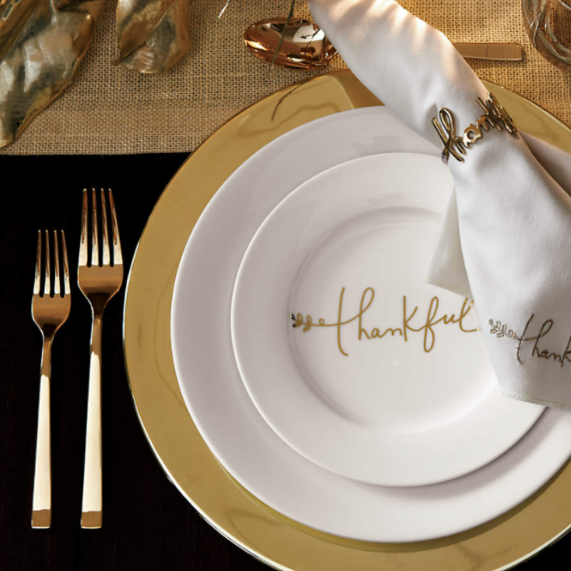 Gold Charger with white plates from Crate & Barrel