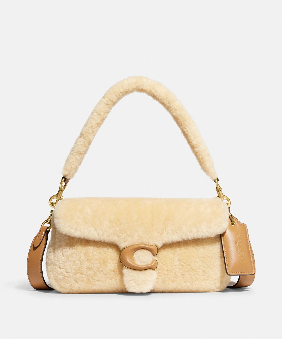 Image of a Coach tabby bag in shearling.