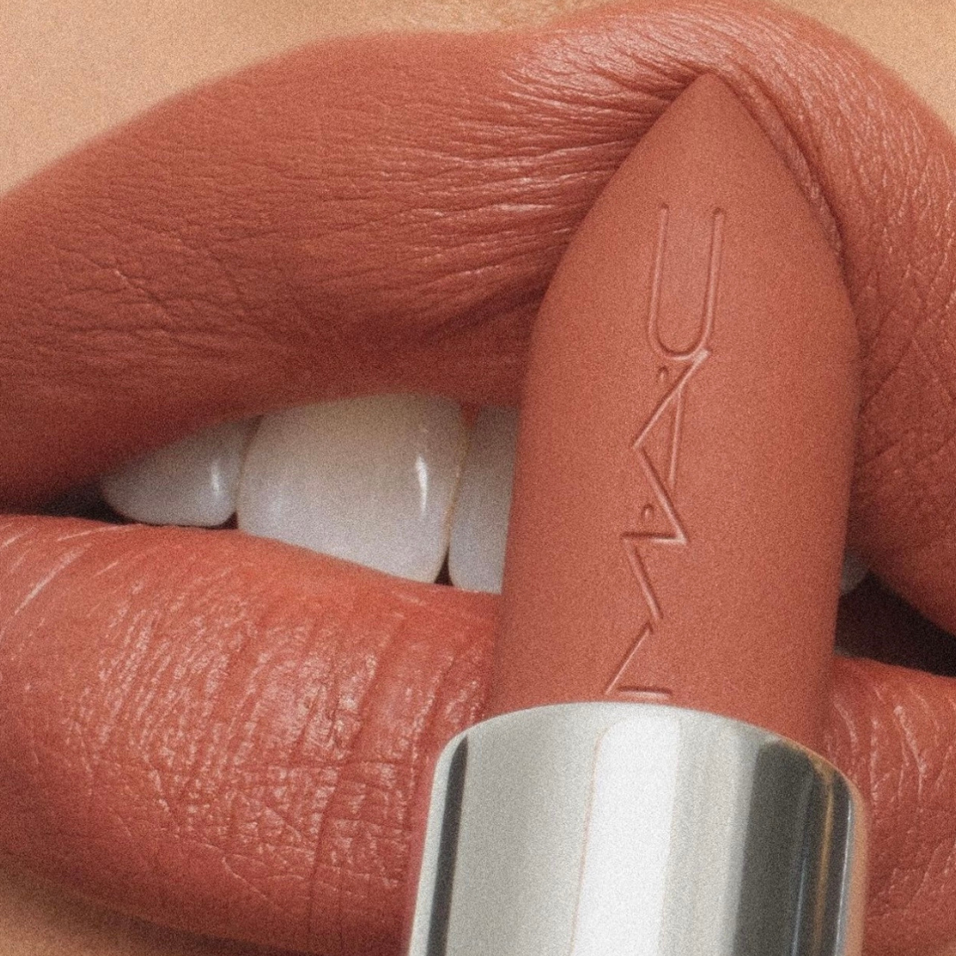 Lipstick being applied onto lips