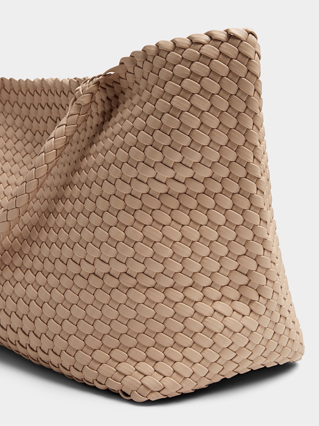 A beige textured purse
