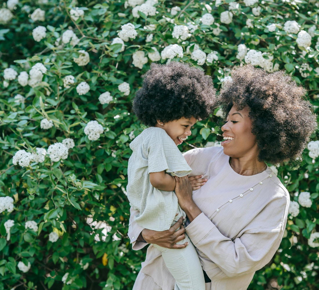 A mother holding her daughter