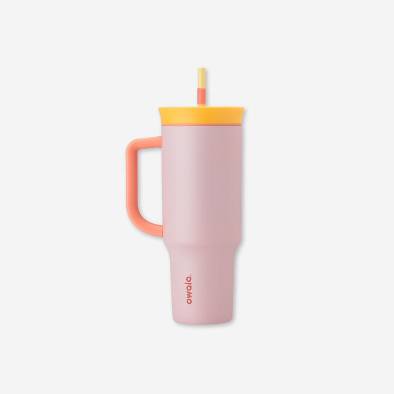A pink water bottle tumbler with a straw.