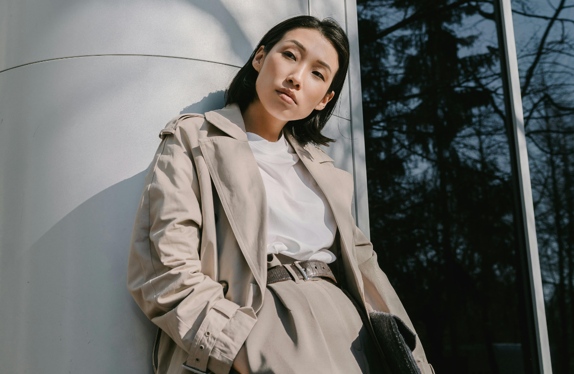 A woman in a trench coat